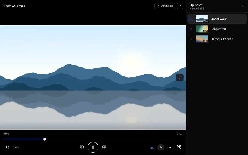 A video playing in the viewer, with its seek bar and controls, and Up next beside it with the other videos of the list.